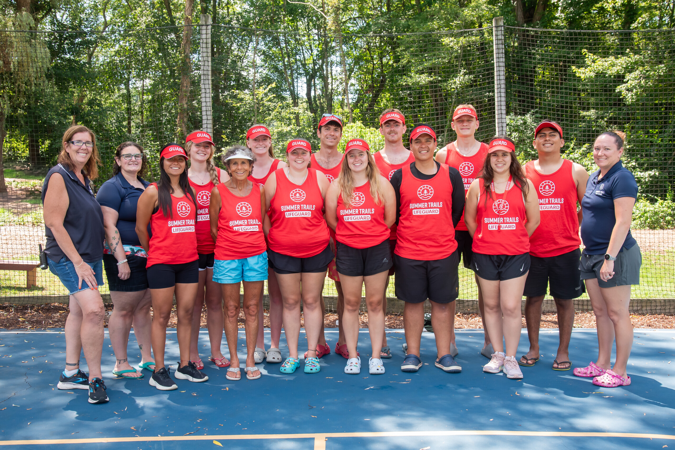 A group of campers with Summer Trails staff and Jaws the Turtle.