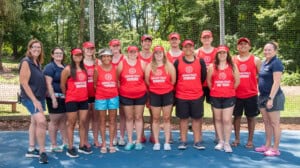 A group of campers with Summer Trails staff and Jaws the Turtle.